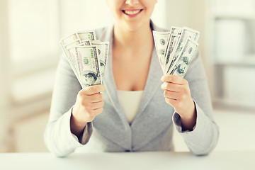 Image showing close up of woman hands holding us dollar money