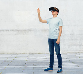 Image showing happy man in virtual reality headset or 3d glasses