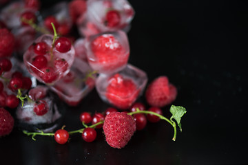 Image showing Frozen berries on wooden table