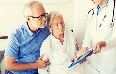 Image showing senior woman and doctor with tablet pc at hospital