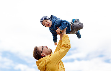 Image showing father with son playing and having fun outdoors