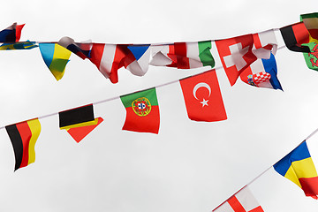 Image showing close up of international flags garland decoration