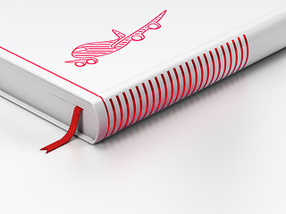 Image showing Vacation concept: closed book, Airplane on white background