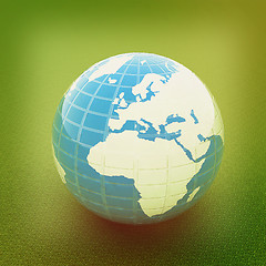 Image showing Earth on green. 3D illustration. Vintage style.