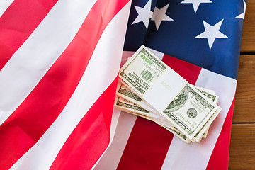 Image showing close up of american flag and dollar cash money