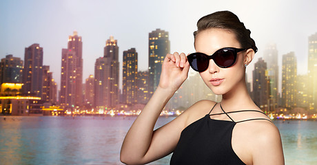 Image showing beautiful young woman in elegant black sunglasses