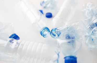 Image showing close up of empty used plastic bottles on table