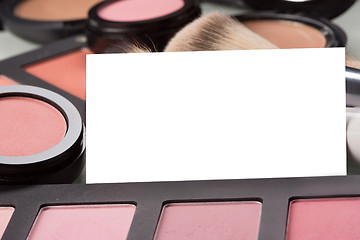 Image showing makeup cosmetics for eyes and bussiness card