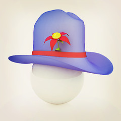 Image showing Blue hat on a blue hat with fantastic flower on white background
