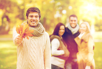 Image showing group of friends having fun in autumn park