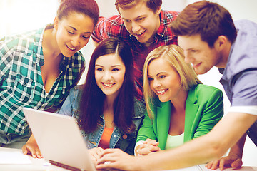 Image showing students looking at tablet pc in lecture at school