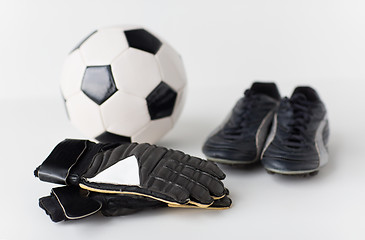 Image showing close up of goalkeeper gloves, ball, soccer boots