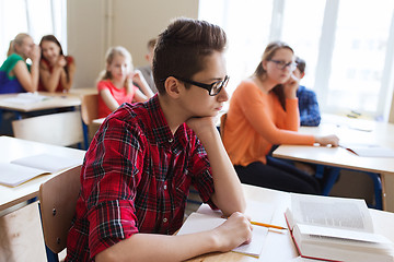 Image showing group of students with notebooks at school lesson