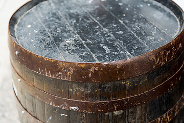 Image showing close up of old wooden barrel outdoors