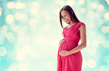 Image showing happy pregnant woman with big tummy