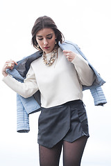 Image showing fashionable young model posing with trendy clothes