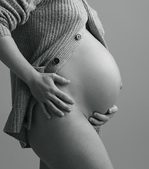 Image showing Pregnant Woman holding her hands on beautiful belly