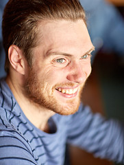 Image showing happy smiling young man face