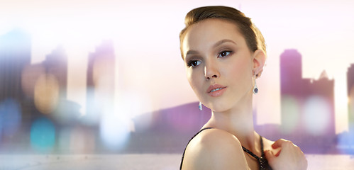 Image showing beautiful young asian woman with earring