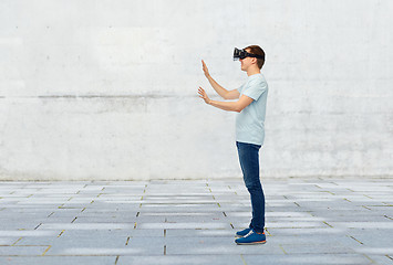 Image showing happy man in virtual reality headset or 3d glasses