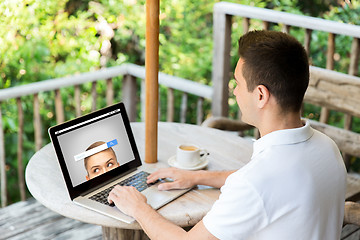 Image showing close up of businessman with laptop on terrace