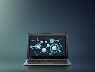 Image showing laptop computer with molecules structure on screen