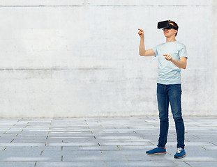 Image showing happy man in virtual reality headset or 3d glasses