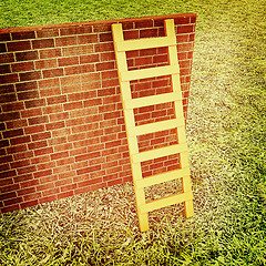 Image showing Ladder leans on brick wall . 3D illustration. Vintage style.