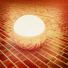 Image showing Chrome ball on the brick floor . 3D illustration. Vintage style.