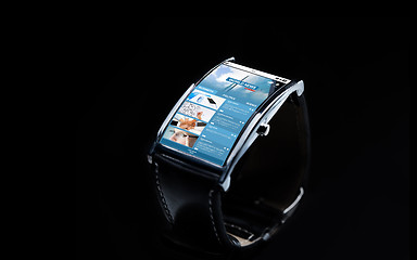 Image showing close up of smart watch with business news