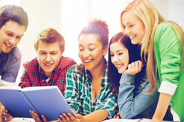 Image showing students reading book at school