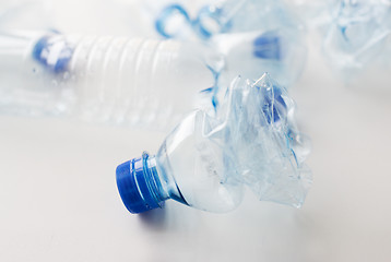 Image showing close up of empty used plastic bottles on table