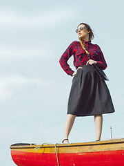 Image showing fashionable young model posing with trendy clothes