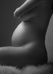 Image showing Pregnant Woman holding her hands on beautiful belly