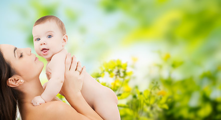 Image showing happy mother holding adorable baby