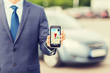 Image showing close up of business man with smartphone navigator