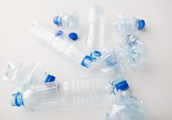 Image showing close up of empty used plastic bottles on table