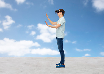 Image showing happy man in virtual reality headset or 3d glasses