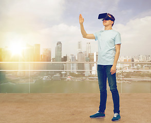 Image showing happy man in virtual reality headset or 3d glasses