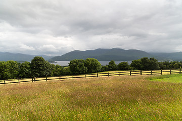 Image showing view to lake and farmland at connemara in ireland