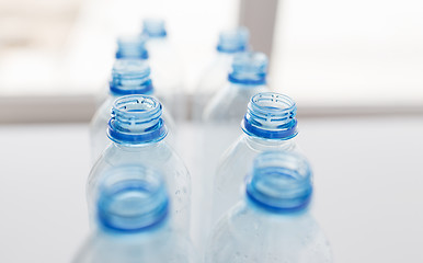 Image showing close up of empty used plastic bottles on table