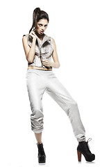 Image showing fashionable young model posing with trendy clothes