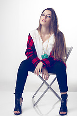 Image showing fashionable young model posing with trendy clothes