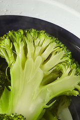 Image showing natural pieces of green healthy broccoli just steamed