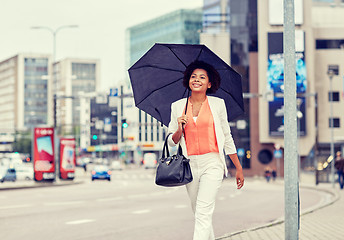 Image showing happy african american businesswoman with umbrella