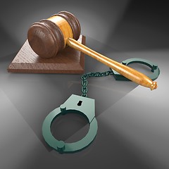 Image showing handcuffs and gavel 3d illustration