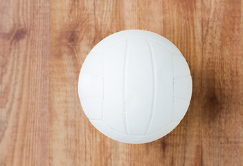 Image showing close up of volleyball ball on wooden floor