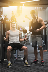 Image showing man exercising on gym machine