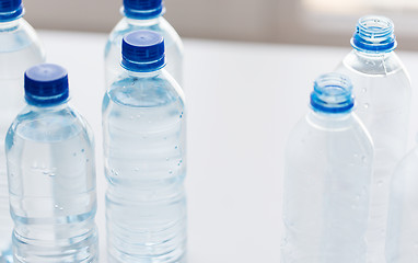 Image showing close up of bottles with drinking water on table