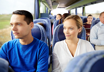 Image showing happy couple or passengers in travel bus